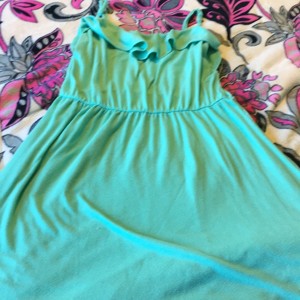 A turquoise dress